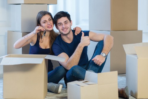 Removal team preparing household furniture for a Chessington move