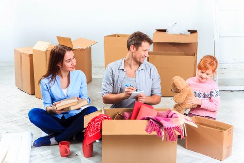 Professional moving van service in Chessington with boxes and equipment