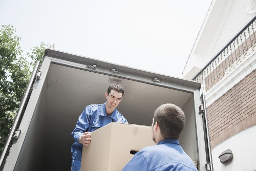 Safety-focused moving team working around a van