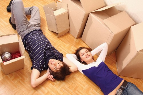 Team member preparing boxes for safe lifting during a move