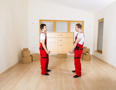 Professional removals team handling business assets in Chessington
